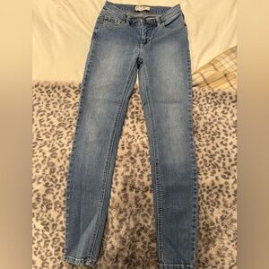 Free People high waisted skinny jeans.